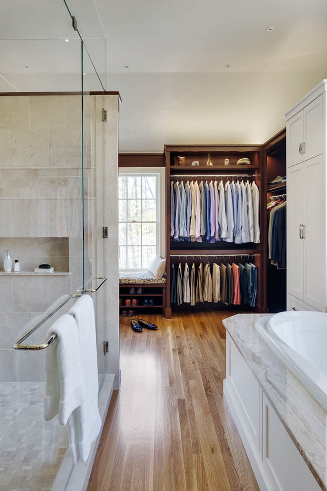 Inspiration for a large classic bathroom in Boston with beaded cabinets, dark wood cabinets, a hot tub, an alcove shower, medium hardwood flooring, a built-in sink and marble worktops.