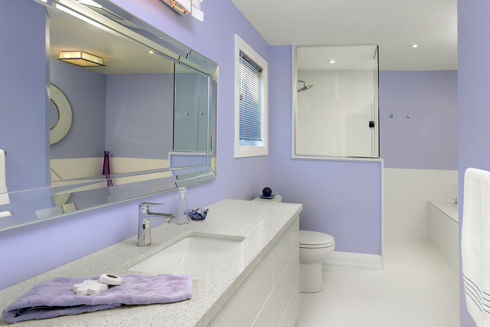 Medium sized modern ensuite bathroom in Toronto with flat-panel cabinets, white cabinets, engineered stone worktops, a built-in bath, white tiles, purple walls and porcelain flooring.