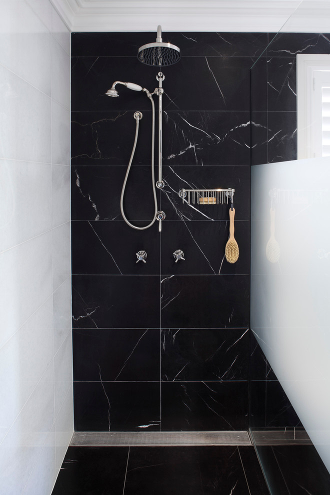 Bathroom - large contemporary master black tile, black and white tile and white tile marble floor and black floor bathroom idea in Sydney with a two-piece toilet, white walls, a console sink and a hinged shower door