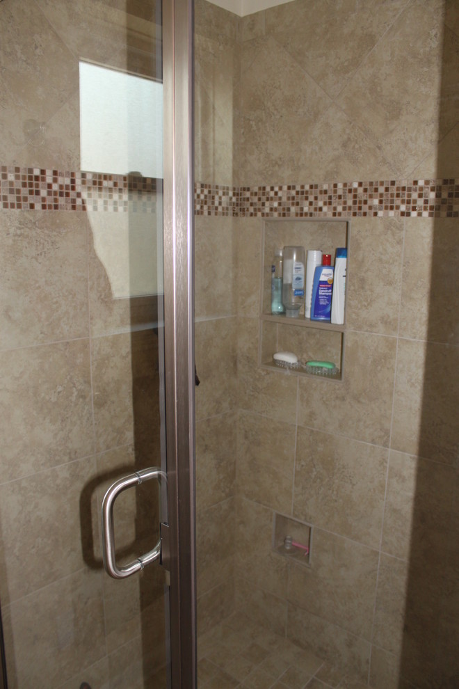 This is an example of a small classic shower room bathroom in Houston with a submerged sink, recessed-panel cabinets, white cabinets, granite worktops, a built-in bath, a shower/bath combination, a two-piece toilet, beige tiles, mosaic tiles, beige walls and porcelain flooring.
