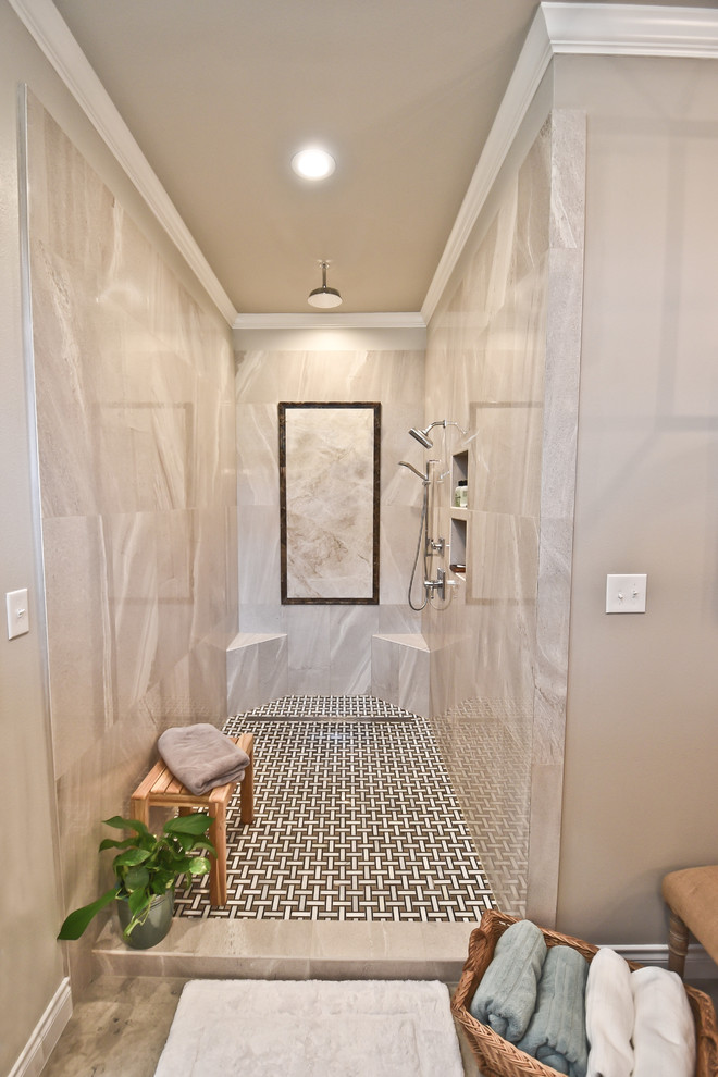 This is an example of a classic ensuite bathroom in Houston with an alcove shower, grey tiles, porcelain tiles and limestone flooring.