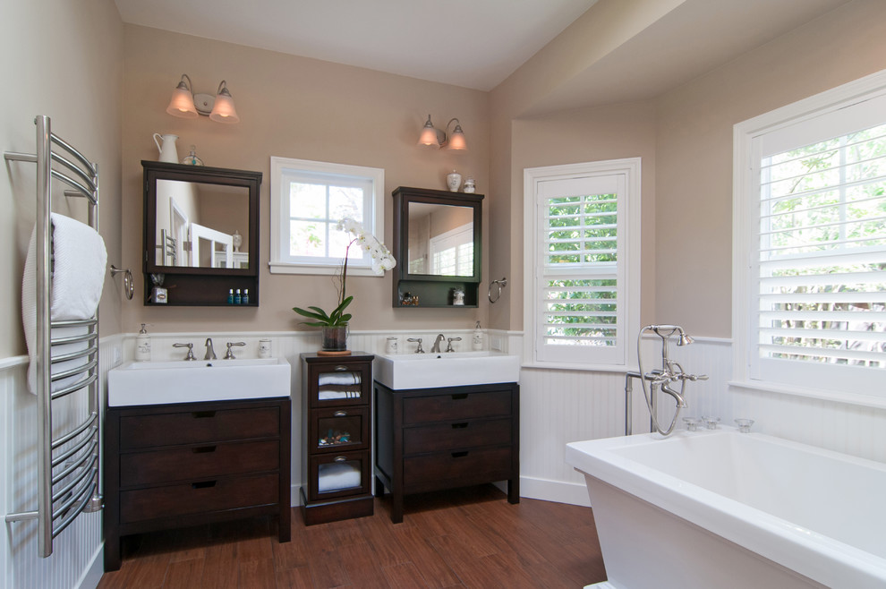Example of a classic bathroom design in San Francisco with dark wood cabinets