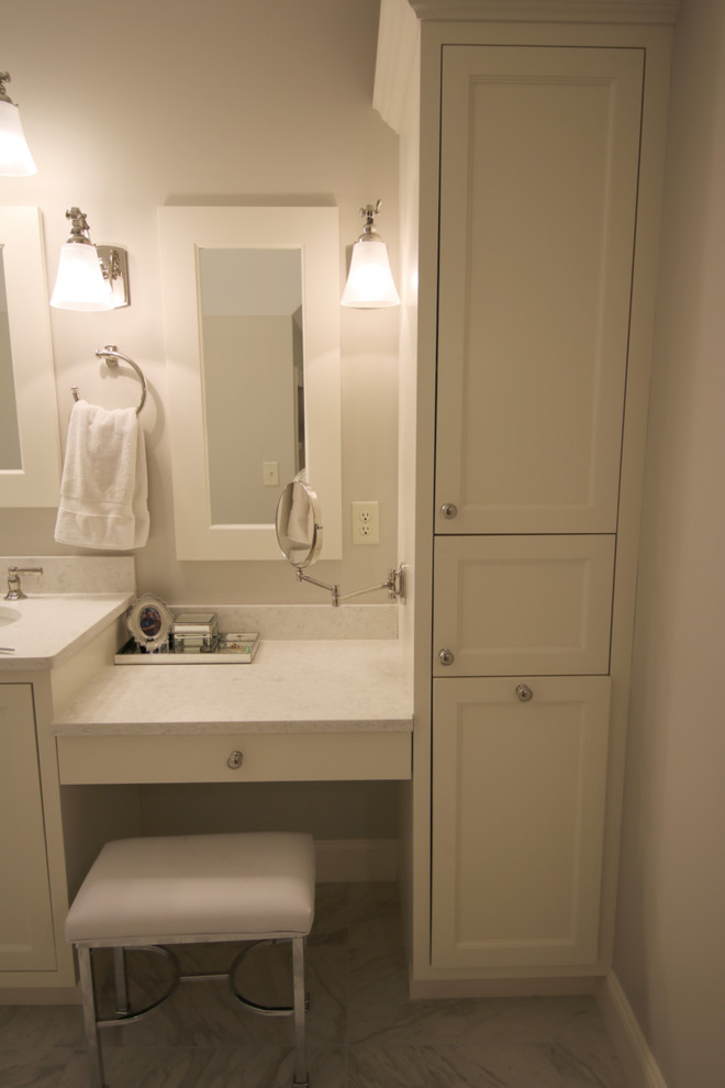 Medium sized traditional ensuite bathroom in Boston with shaker cabinets, white cabinets, an alcove shower, a two-piece toilet, black and white tiles, ceramic tiles, beige walls, ceramic flooring, a submerged sink, quartz worktops, grey floors and a hinged door.