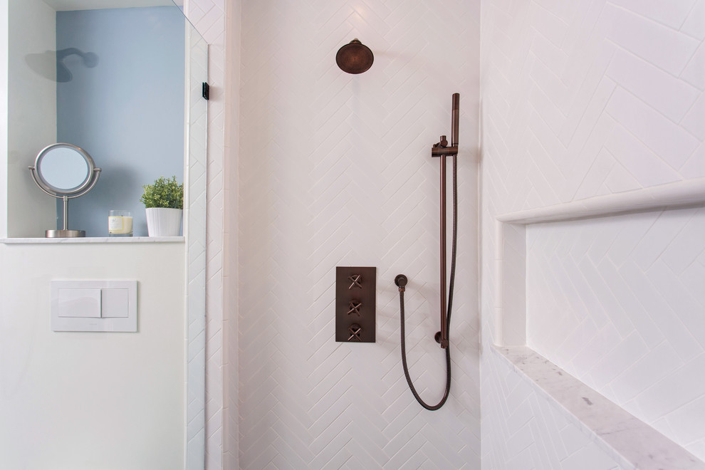 Example of a mid-sized danish 3/4 white tile and porcelain tile cement tile floor and black floor alcove shower design in Los Angeles with furniture-like cabinets, black cabinets, a wall-mount toilet, gray walls, an undermount sink, marble countertops and a hinged shower door