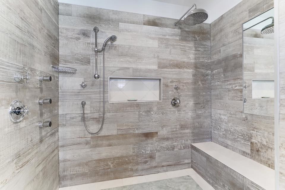 Inspiration for a large timeless master gray tile and porcelain tile marble floor alcove shower remodel in New York with recessed-panel cabinets, white cabinets, gray walls, an undermount sink and marble countertops