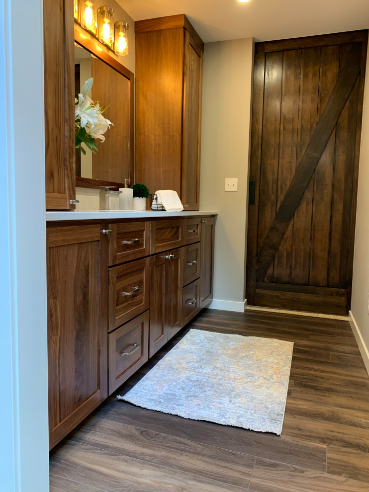 Photo of a medium sized rural ensuite bathroom in Seattle with shaker cabinets, a one-piece toilet, grey walls, vinyl flooring, a submerged sink, quartz worktops, beige worktops, a single sink and a built in vanity unit.