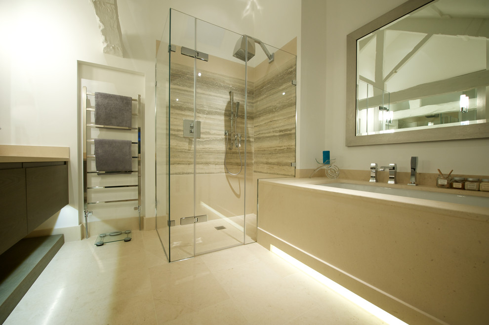 Medium sized contemporary ensuite bathroom in Other with flat-panel cabinets, medium wood cabinets, a built-in bath, a corner shower, beige tiles and a built-in sink.