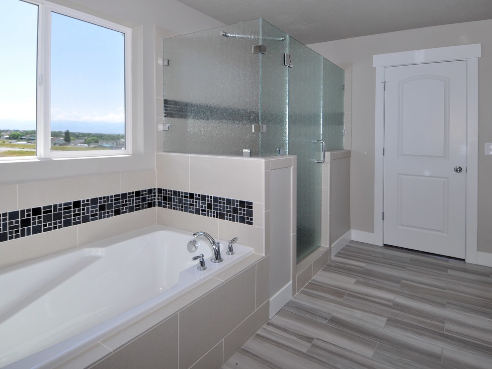 Photo of a medium sized classic ensuite bathroom in Salt Lake City with shaker cabinets, white cabinets, an alcove bath, a corner shower, a two-piece toilet, multi-coloured tiles, ceramic tiles, grey walls, ceramic flooring, a submerged sink, granite worktops, multi-coloured floors and a hinged door.
