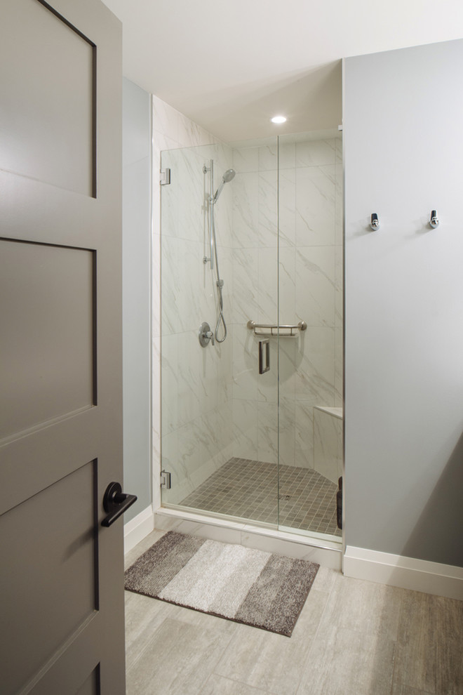 Photo of a large rustic family bathroom in Vancouver with shaker cabinets, grey cabinets, an alcove shower, a two-piece toilet, grey tiles, porcelain tiles, white walls, porcelain flooring, a submerged sink, engineered stone worktops, grey floors and a hinged door.