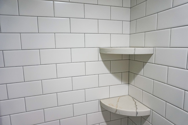 white subway tile grey grout bathroom