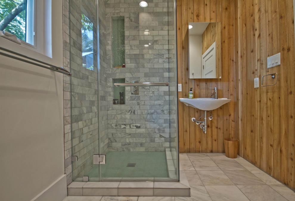 Design ideas for a small traditional shower room bathroom in Houston with a corner shower, a two-piece toilet, grey tiles, marble tiles, white walls, marble flooring, a wall-mounted sink, white floors and a hinged door.