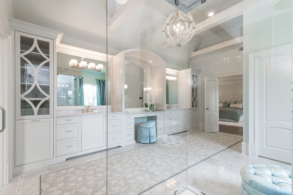 Expansive classic ensuite bathroom in Atlanta with freestanding cabinets, white cabinets and marble worktops.