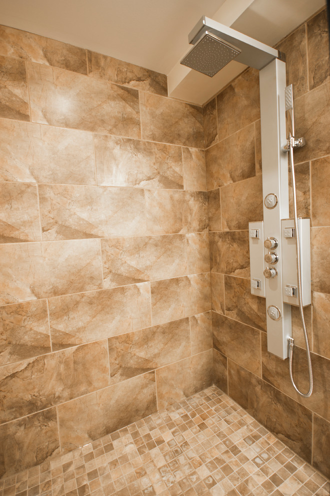 Design ideas for a medium sized contemporary shower room bathroom in Ottawa with a vessel sink, glass-front cabinets, dark wood cabinets, glass worktops, an alcove shower, a one-piece toilet, brown tiles, ceramic tiles, beige walls and ceramic flooring.
