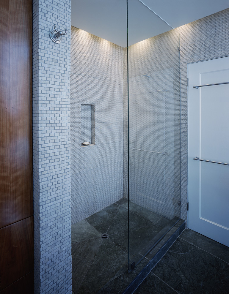 This is an example of a modern bathroom in San Francisco with mosaic tiles.