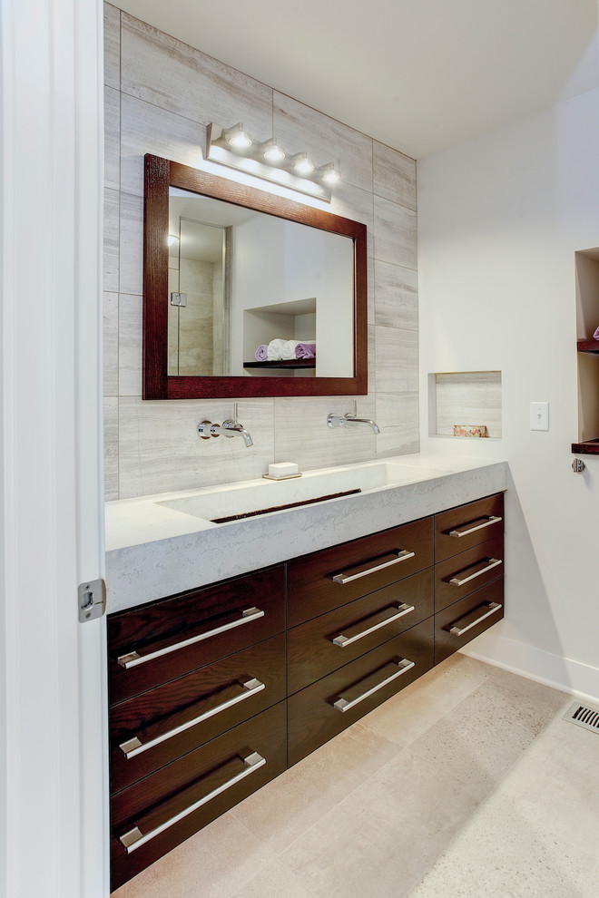 Photo of a medium sized contemporary shower room bathroom in Minneapolis with a trough sink, flat-panel cabinets, dark wood cabinets, an alcove shower and grey tiles.