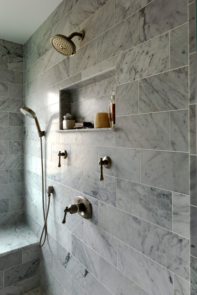 Design ideas for a large traditional ensuite bathroom in DC Metro with beaded cabinets, white cabinets, blue tiles, mosaic tiles, white walls, marble worktops, a built-in bath, an alcove shower, a one-piece toilet, porcelain flooring, a submerged sink, grey floors and a hinged door.