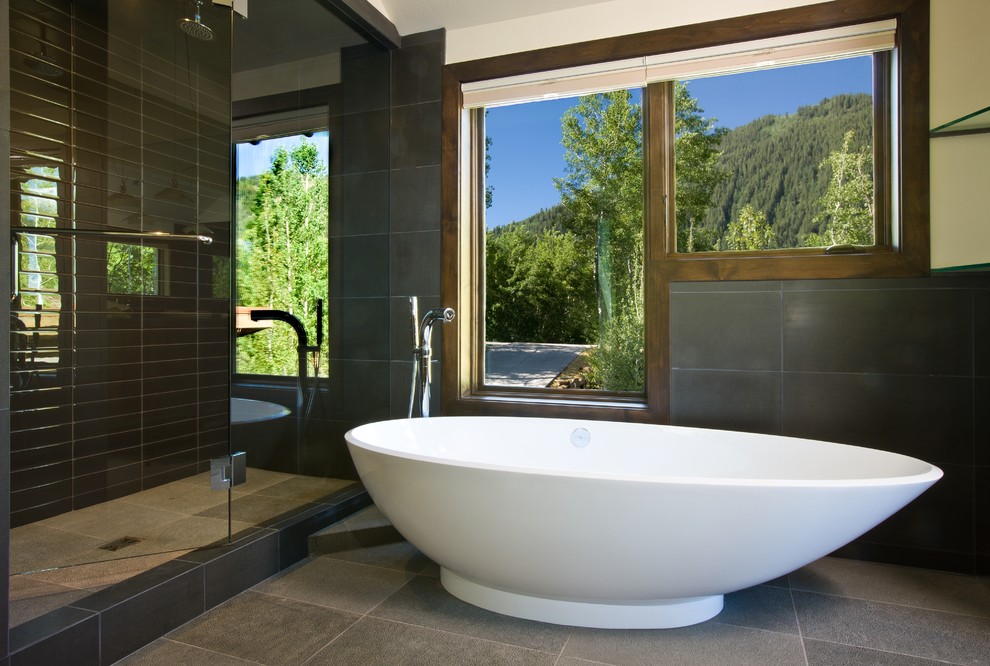 Photo of a contemporary bathroom in Denver with a freestanding bath.
