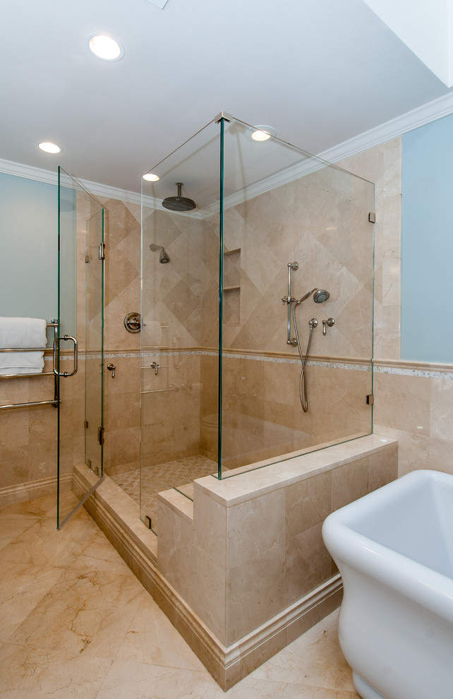 Example of a large trendy master beige tile and stone tile marble floor bathroom design in DC Metro with an undermount sink, shaker cabinets, dark wood cabinets, granite countertops, a one-piece toilet and blue walls