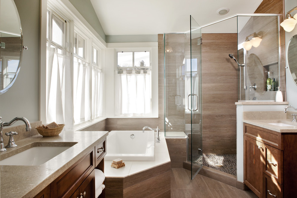 Transitional corner shower photo in Denver with an undermount sink