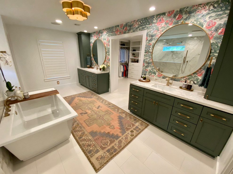 Example of a mid-sized transitional master ceramic tile, white floor, double-sink and wallpaper bathroom design in Houston with shaker cabinets, green cabinets, a two-piece toilet, white walls, an undermount sink, quartz countertops, white countertops and a built-in vanity