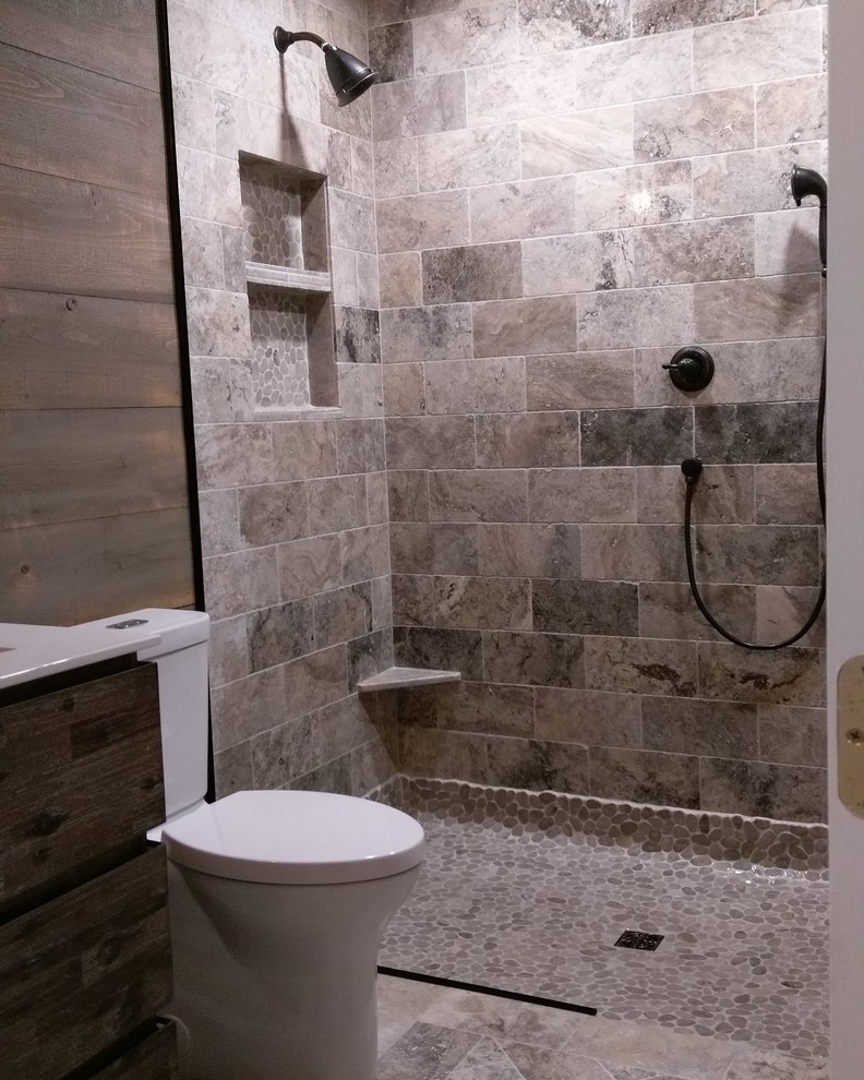 Design ideas for a rustic bathroom in Philadelphia with a built-in shower, stone tiles and travertine flooring.