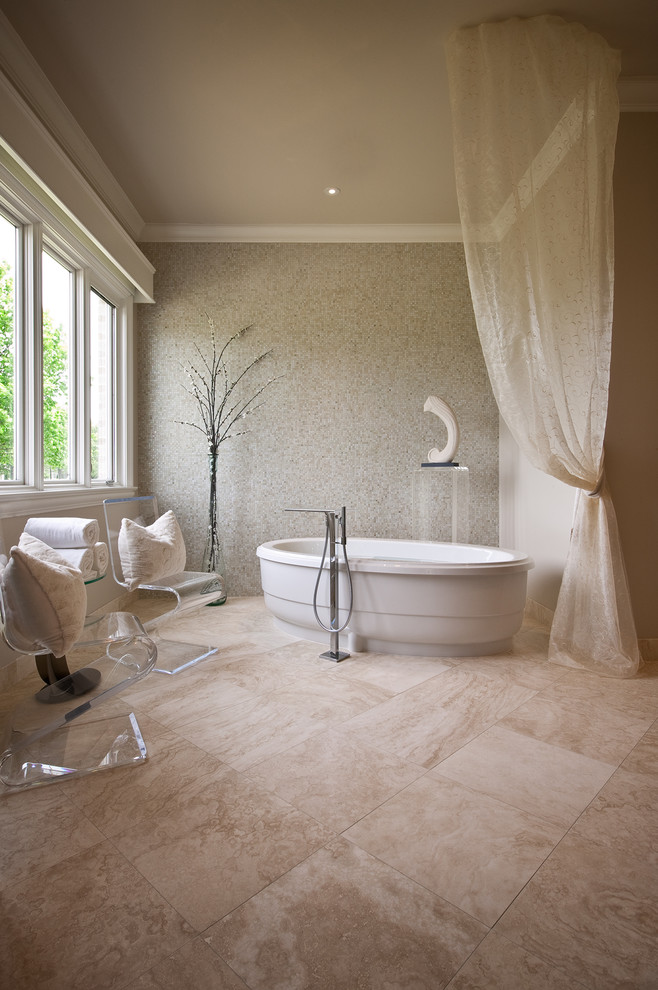 Inspiration for a contemporary mosaic tile and beige tile travertine floor freestanding bathtub remodel in Austin with beige walls