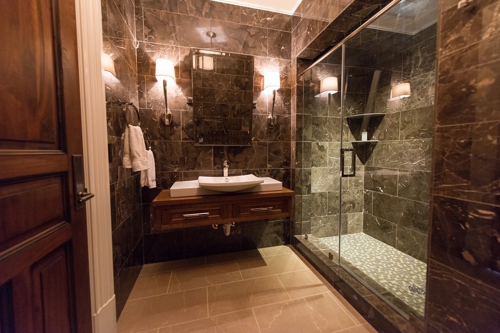 Exemple d'une grande salle d'eau chic en bois brun avec une vasque, une douche à l'italienne, un placard à porte affleurante et un sol en marbre.