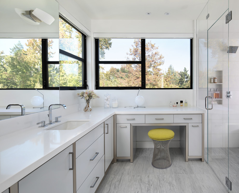 Example of a mid-sized trendy master white tile and marble tile marble floor and gray floor bathroom design in San Francisco with white walls, a hinged shower door, flat-panel cabinets, gray cabinets, an undermount sink, quartz countertops and white countertops