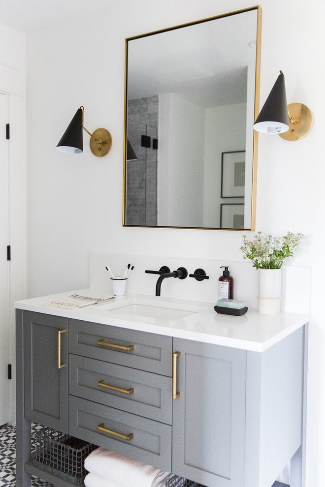 Inspiration for a medium sized classic family bathroom in Salt Lake City with grey cabinets, an alcove shower, a one-piece toilet, white walls, ceramic flooring, a submerged sink, a hinged door and white worktops.