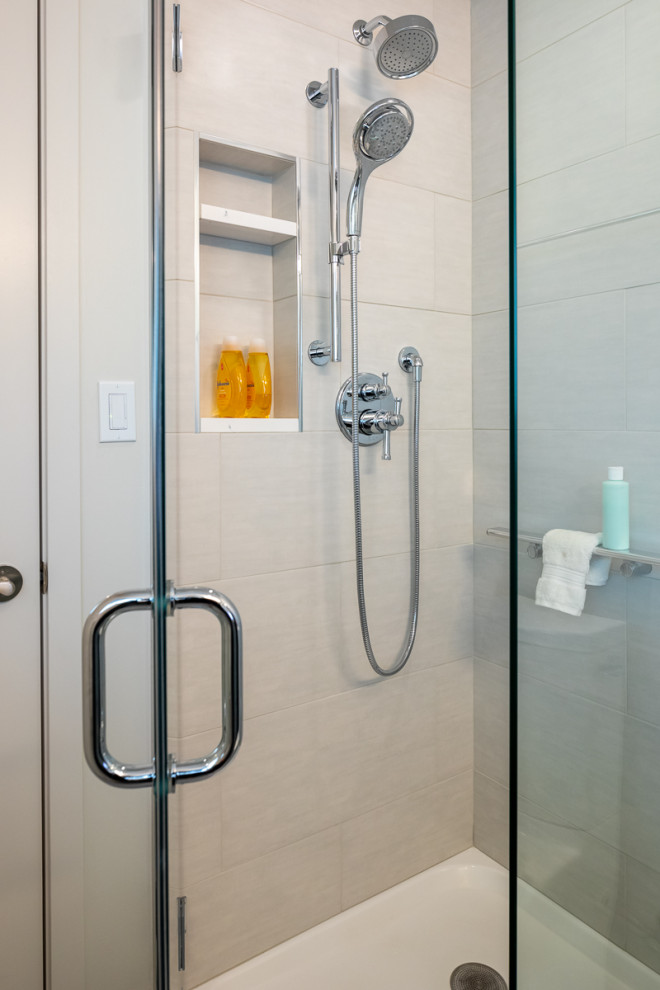 Photo of a small traditional shower room bathroom in Seattle with shaker cabinets, turquoise cabinets, a corner shower, a one-piece toilet, grey tiles, porcelain tiles, white walls, lino flooring, a submerged sink, engineered stone worktops, grey floors, a hinged door, white worktops, a wall niche, a single sink and a built in vanity unit.