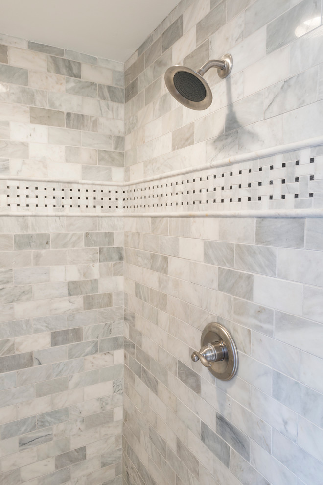 Inspiration for a timeless white tile and ceramic tile ceramic tile bathroom remodel in Indianapolis with an undermount sink, shaker cabinets, white cabinets, marble countertops and a two-piece toilet