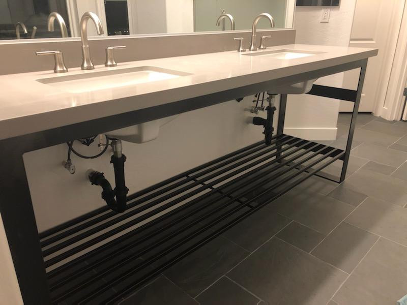 This is an example of a large ensuite bathroom in Oklahoma City with open cabinets, black cabinets, white walls, ceramic flooring, quartz worktops and grey floors.