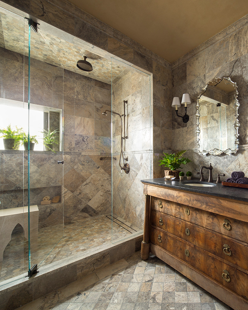 На фото: ванная комната в стиле неоклассика (современная классика) с врезной раковиной, темными деревянными фасадами, душем в нише, бежевой плиткой и окном