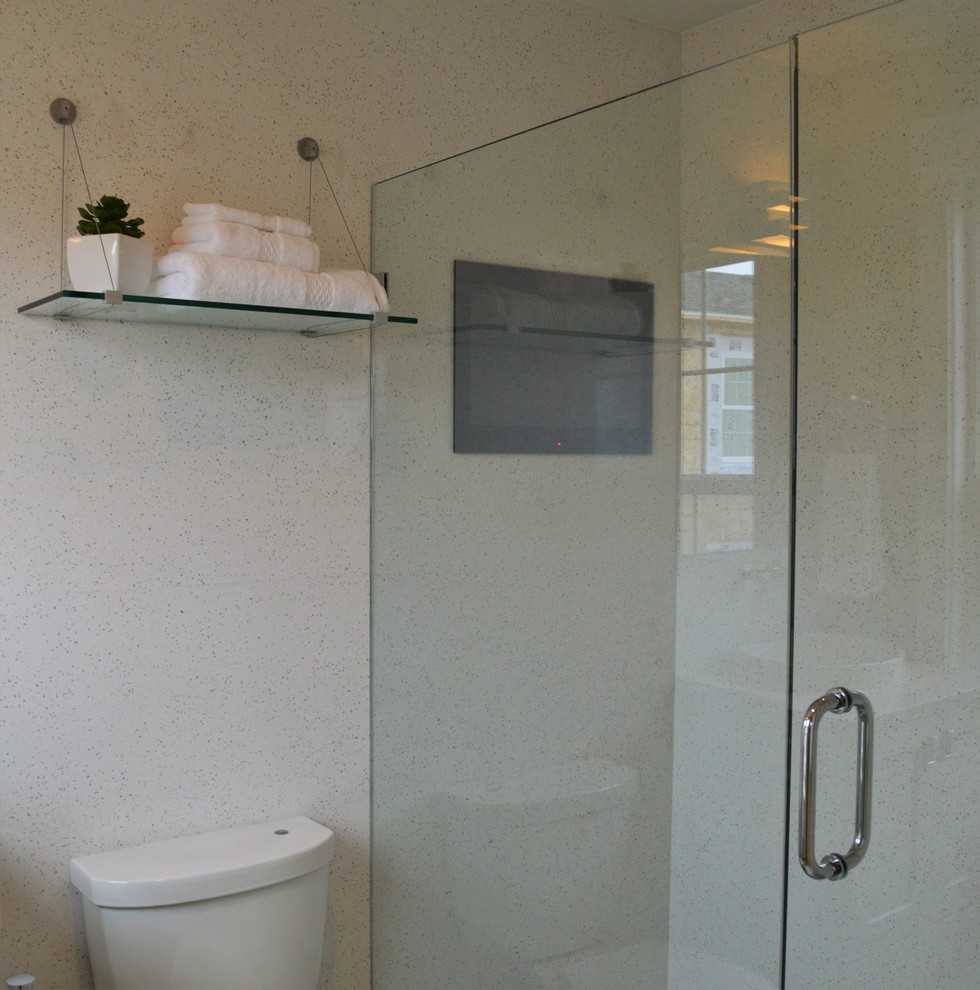 Doorless shower - small 1960s master gray tile and ceramic tile ceramic tile doorless shower idea in Salt Lake City with furniture-like cabinets, white cabinets, a two-piece toilet, green walls, a vessel sink and quartz countertops