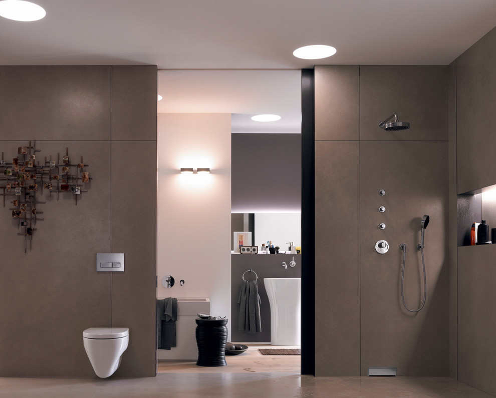 Mid-sized minimalist master brown tile and ceramic tile light wood floor walk-in shower photo in Chicago with a pedestal sink, a wall-mount toilet and multicolored walls