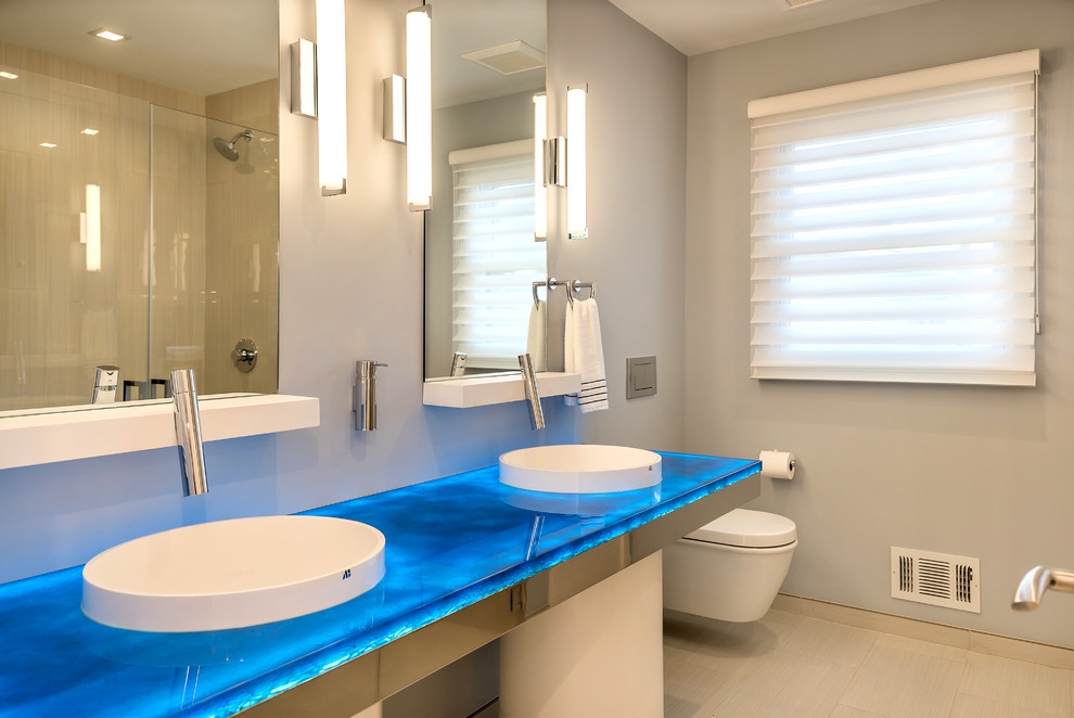 Esempio di una stanza da bagno minimalista con top blu