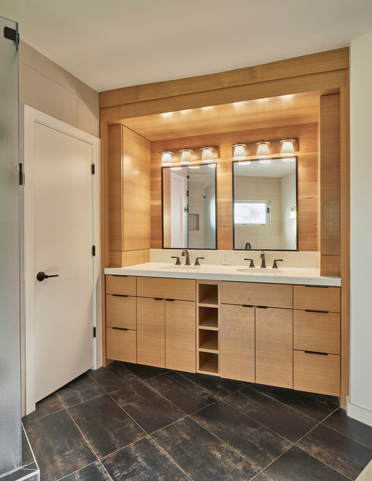 Inspiration for a medium sized midcentury ensuite bathroom in Dallas with light wood cabinets, porcelain flooring, a wall-mounted sink, engineered stone worktops, double sinks and a built in vanity unit.