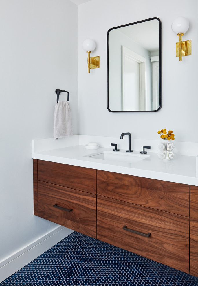 Design ideas for a small retro ensuite bathroom in San Francisco with medium wood cabinets, flat-panel cabinets, white walls, mosaic tile flooring, a submerged sink and blue floors.