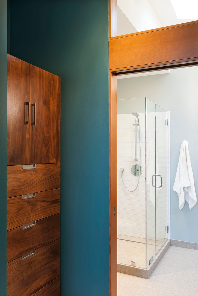 Inspiration for a small 1960s master white tile and subway tile corner shower remodel in Seattle with flat-panel cabinets, dark wood cabinets, a one-piece toilet, blue walls, an undermount sink and quartz countertops