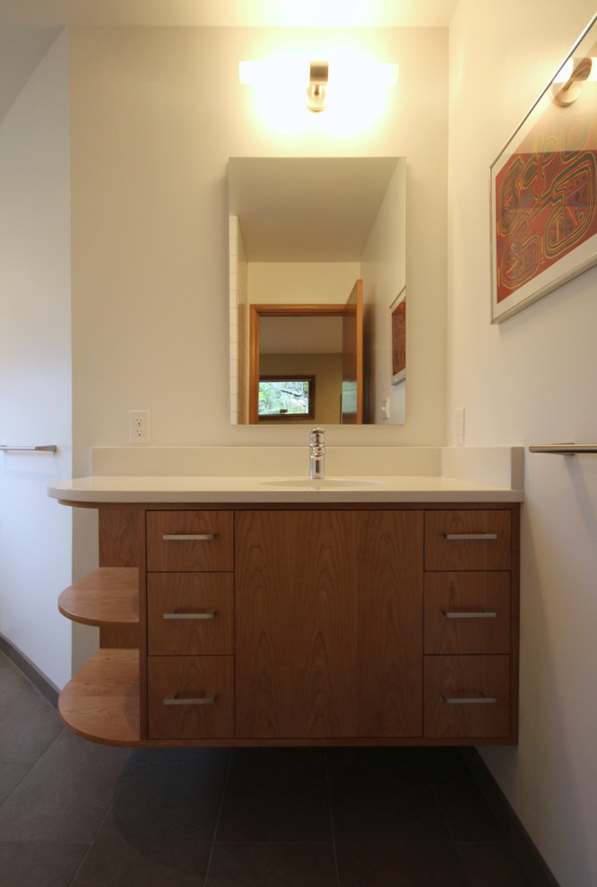 Retro bathroom in Portland with quartz worktops.