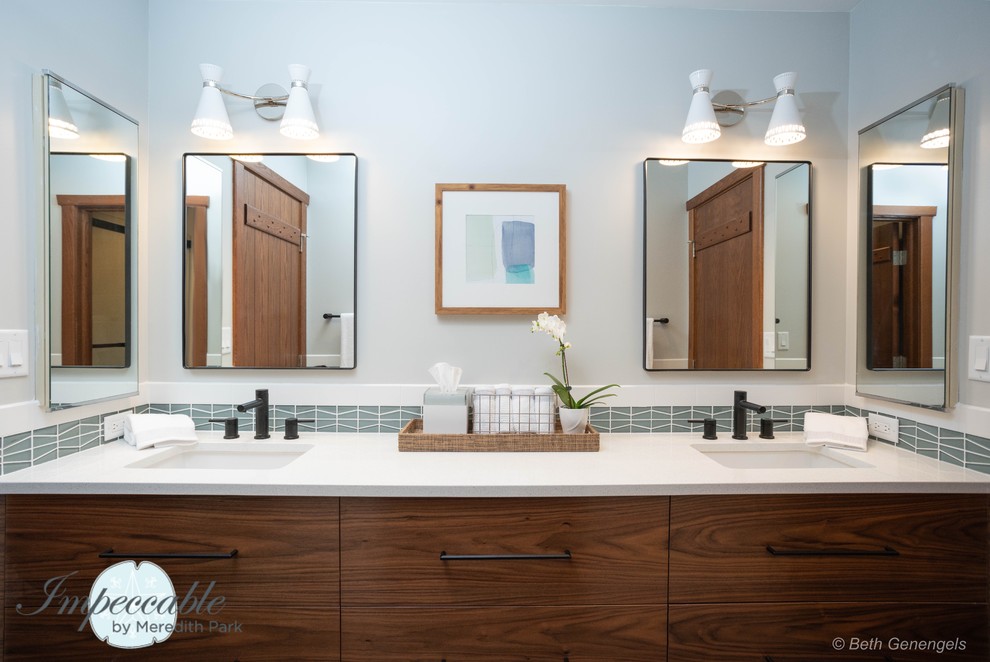 Inspiration for a mid-sized mid-century modern kids' white tile and porcelain tile porcelain tile and gray floor bathroom remodel in Chicago with flat-panel cabinets, dark wood cabinets, a two-piece toilet, gray walls, an undermount sink, quartz countertops and white countertops
