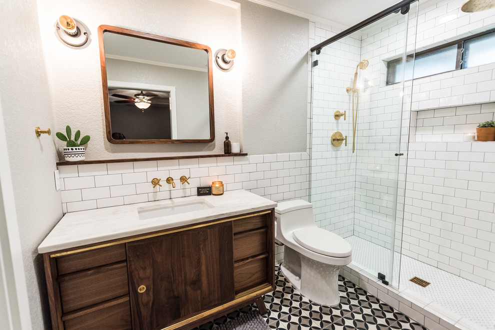 Example of a small mid-century modern master white tile and ceramic tile cement tile floor and multicolored floor bathroom design in Dallas with flat-panel cabinets, dark wood cabinets, gray walls, an undermount sink and marble countertops