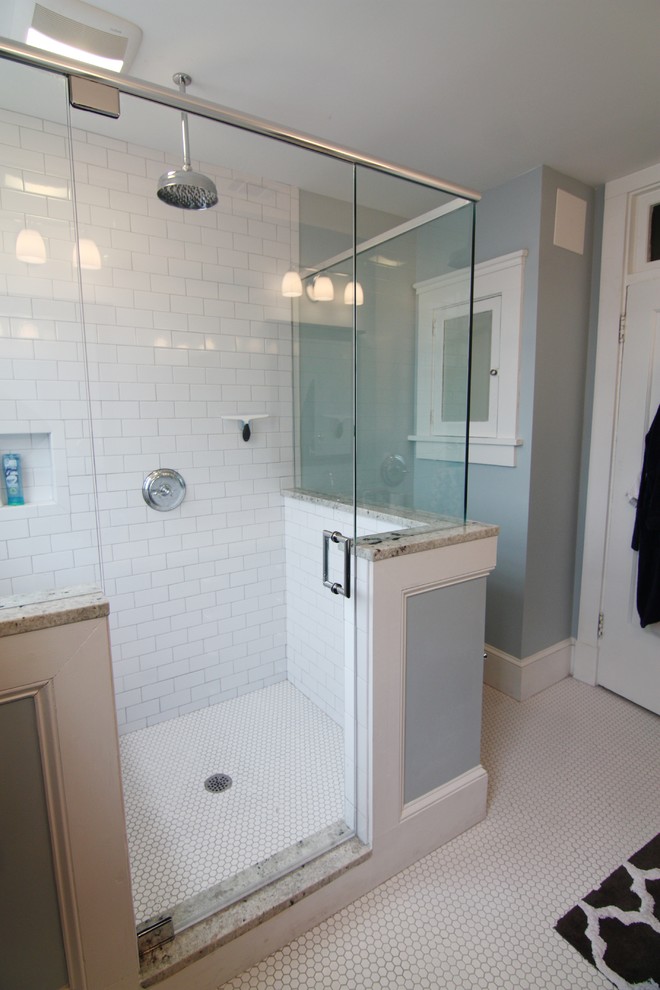 Mid-sized arts and crafts master white tile and ceramic tile mosaic tile floor corner shower photo in Atlanta with an undermount sink, shaker cabinets, dark wood cabinets, granite countertops, a two-piece toilet and blue walls