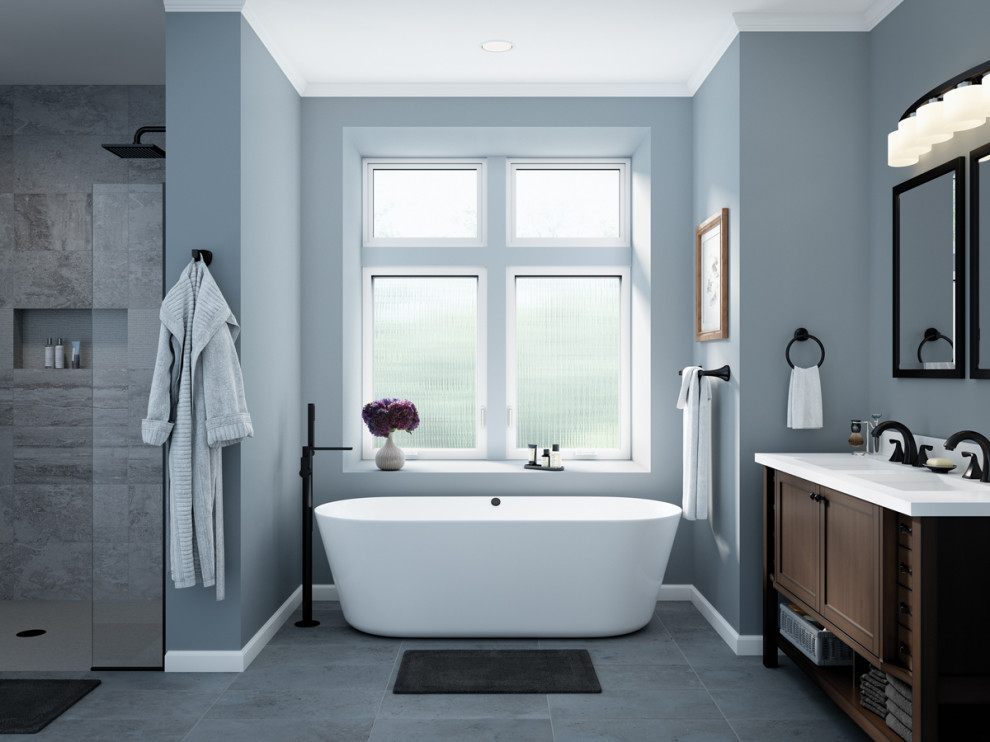 Foto di una stanza da bagno padronale nordica di medie dimensioni con ante in legno bruno, vasca freestanding, doccia a filo pavimento, piastrelle grigie e pareti blu