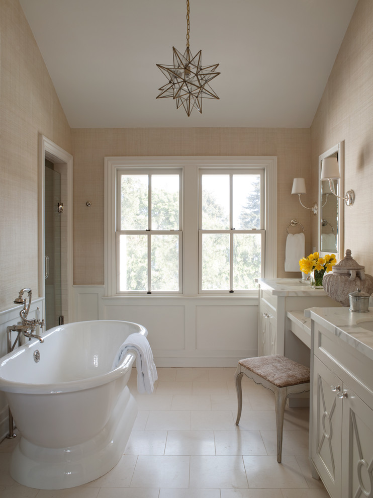 Elegant bathroom photo in San Francisco with marble countertops