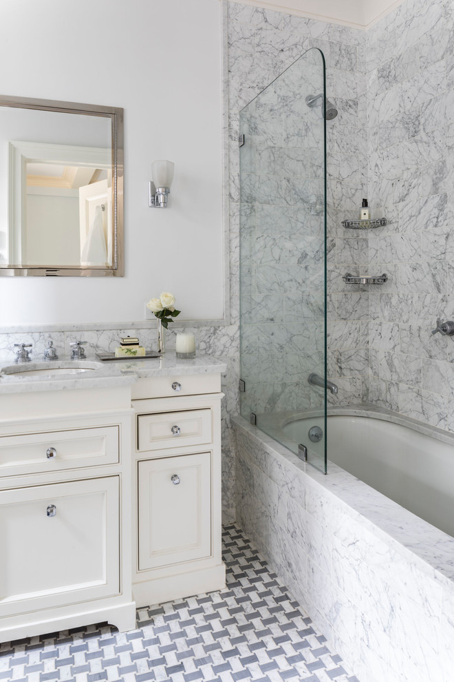 Example of a mid-sized transitional 3/4 marble tile gray floor bathroom design in Denver with beaded inset cabinets, white cabinets, white walls, an undermount sink and marble countertops