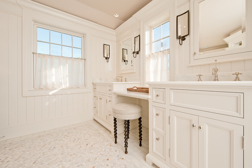 This is an example of a large traditional ensuite bathroom in Boston with recessed-panel cabinets, white cabinets, white walls, mosaic tile flooring, a console sink and white tiles.