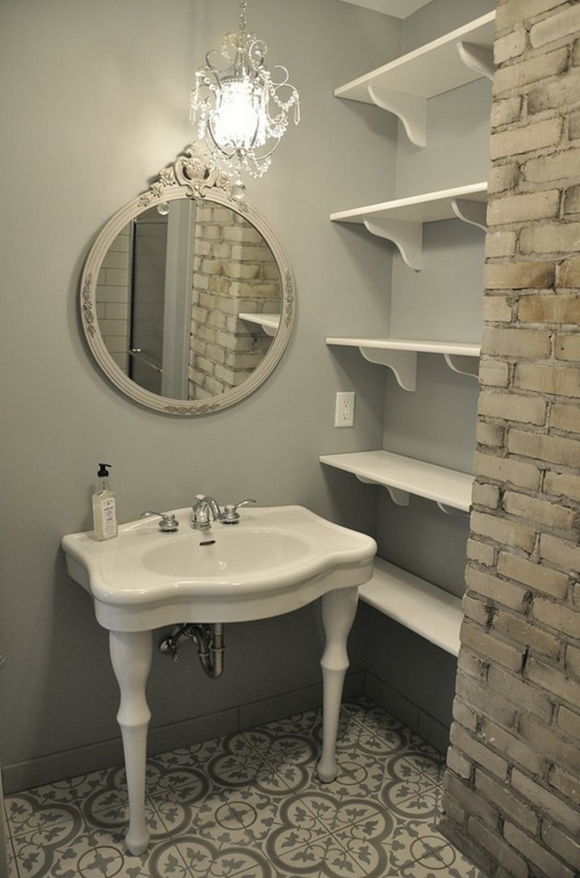 Design ideas for a small classic shower room bathroom in Minneapolis with white cabinets, a claw-foot bath, an alcove shower, a two-piece toilet, grey tiles, ceramic tiles, grey walls, cement flooring, a pedestal sink, grey floors and a hinged door.