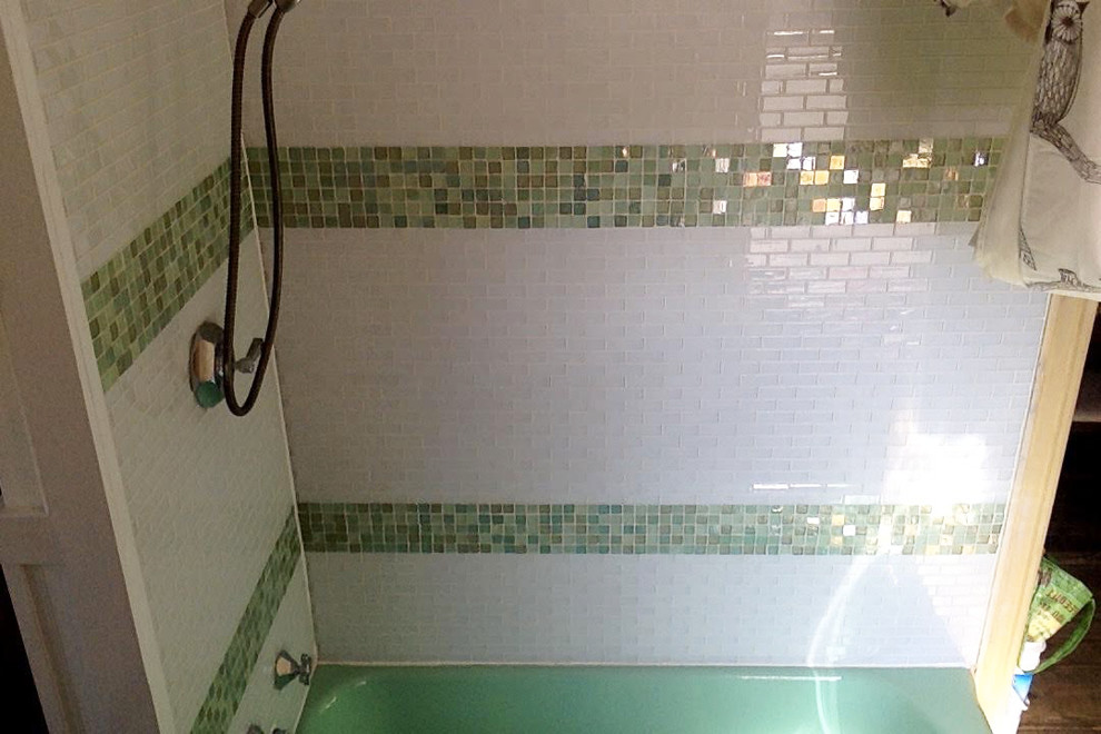 Example of a mid-sized mid-century modern master green tile and glass tile bathroom design in New York with white walls