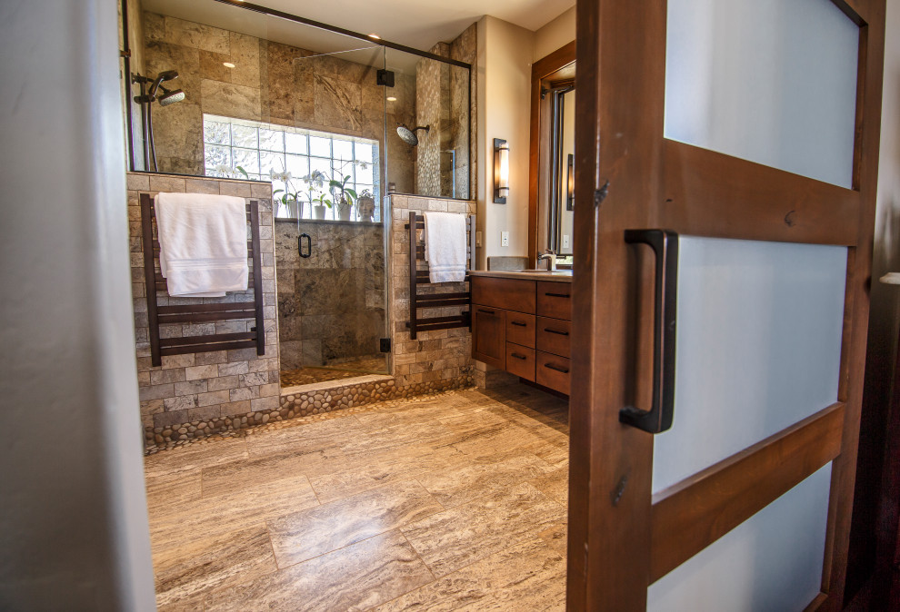 Design ideas for a large rustic ensuite bathroom in Albuquerque with shaker cabinets, medium wood cabinets, a double shower, beige walls, a submerged sink, engineered stone worktops, a hinged door, brown worktops, double sinks and a built in vanity unit.